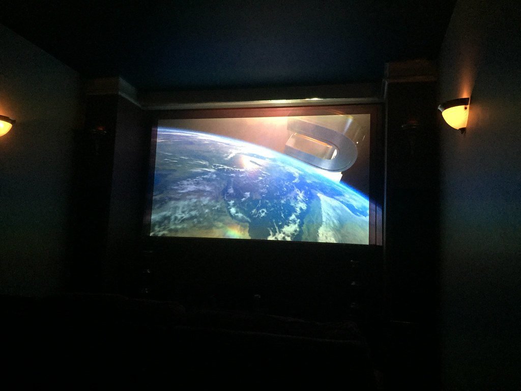 Home theater room with a big screen