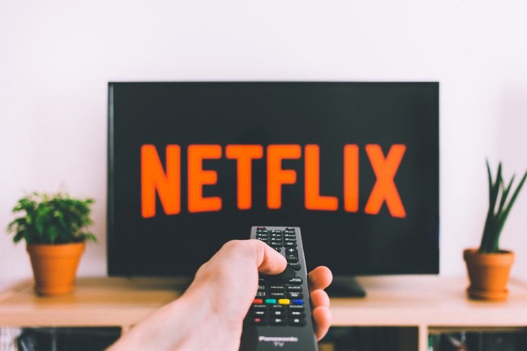 Remote control pointed at a TV streaming app